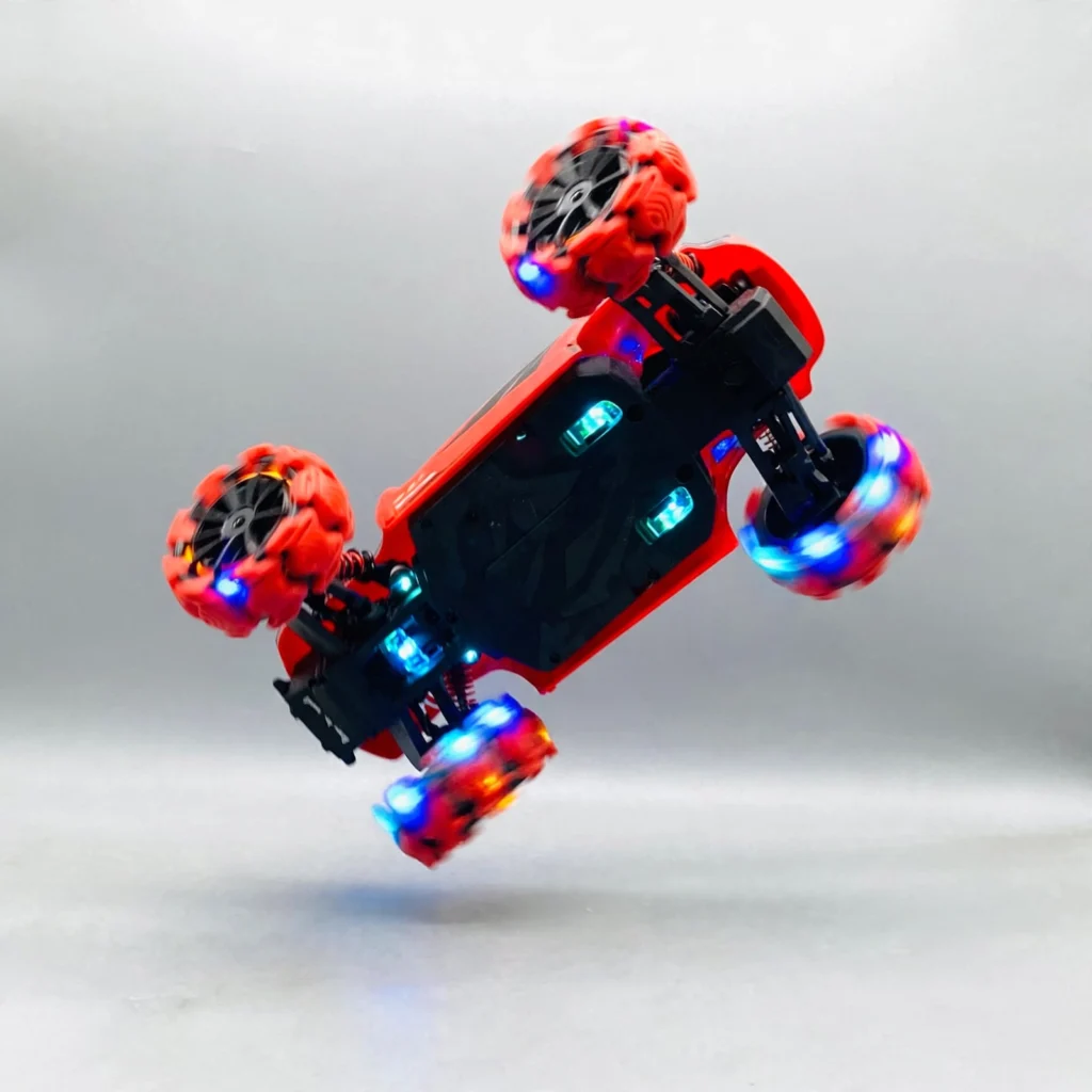 Explosive Wheel RC Stunt Car performing a stunt with LED wheels